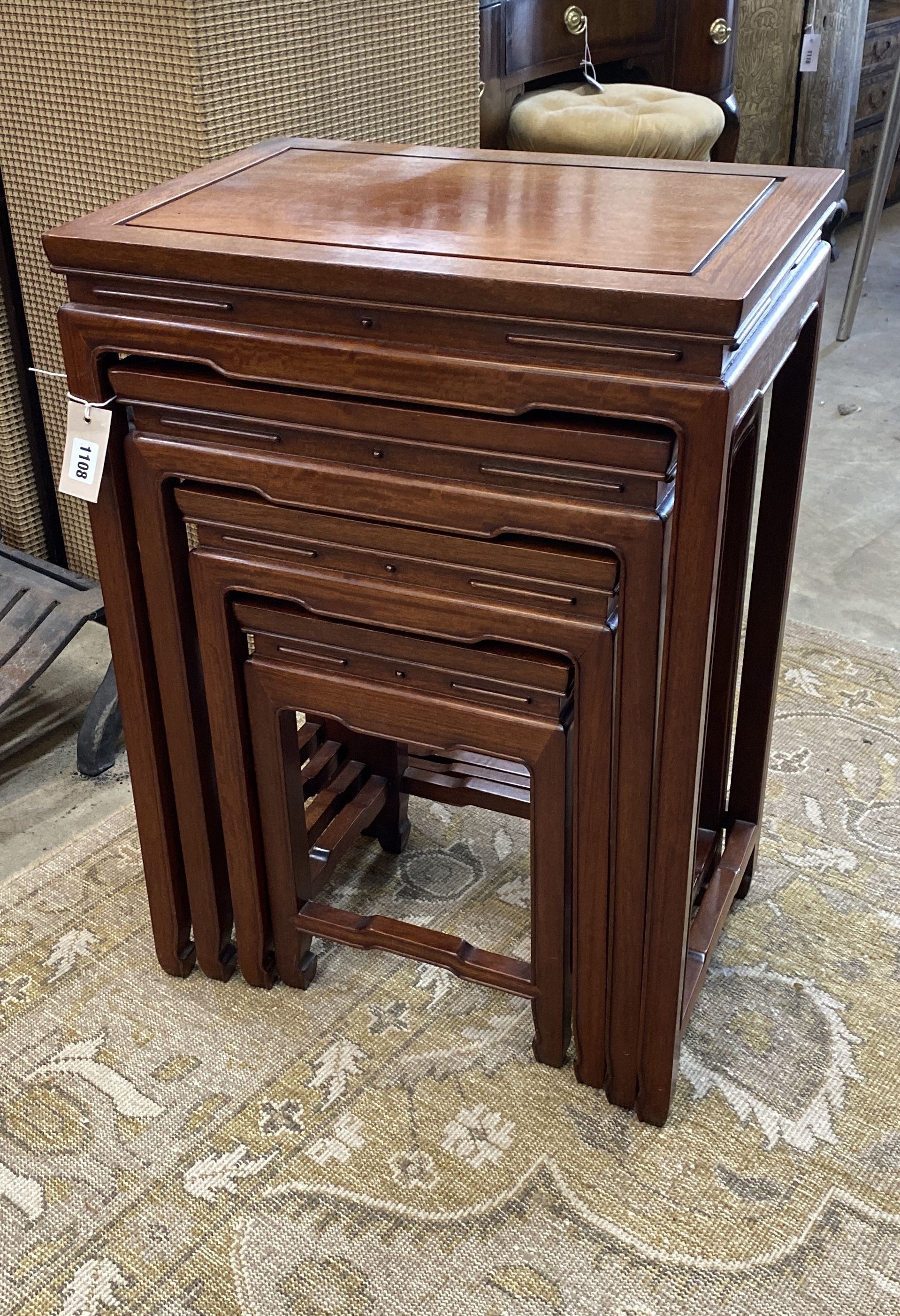 A quartetto of rectangular Chinese hardwood tea tables, width 49cm, depth 34cm, height 70cm